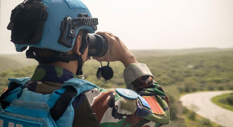 A peacekeeper monitors the Green Hill area in Naqoura, Lebanon.